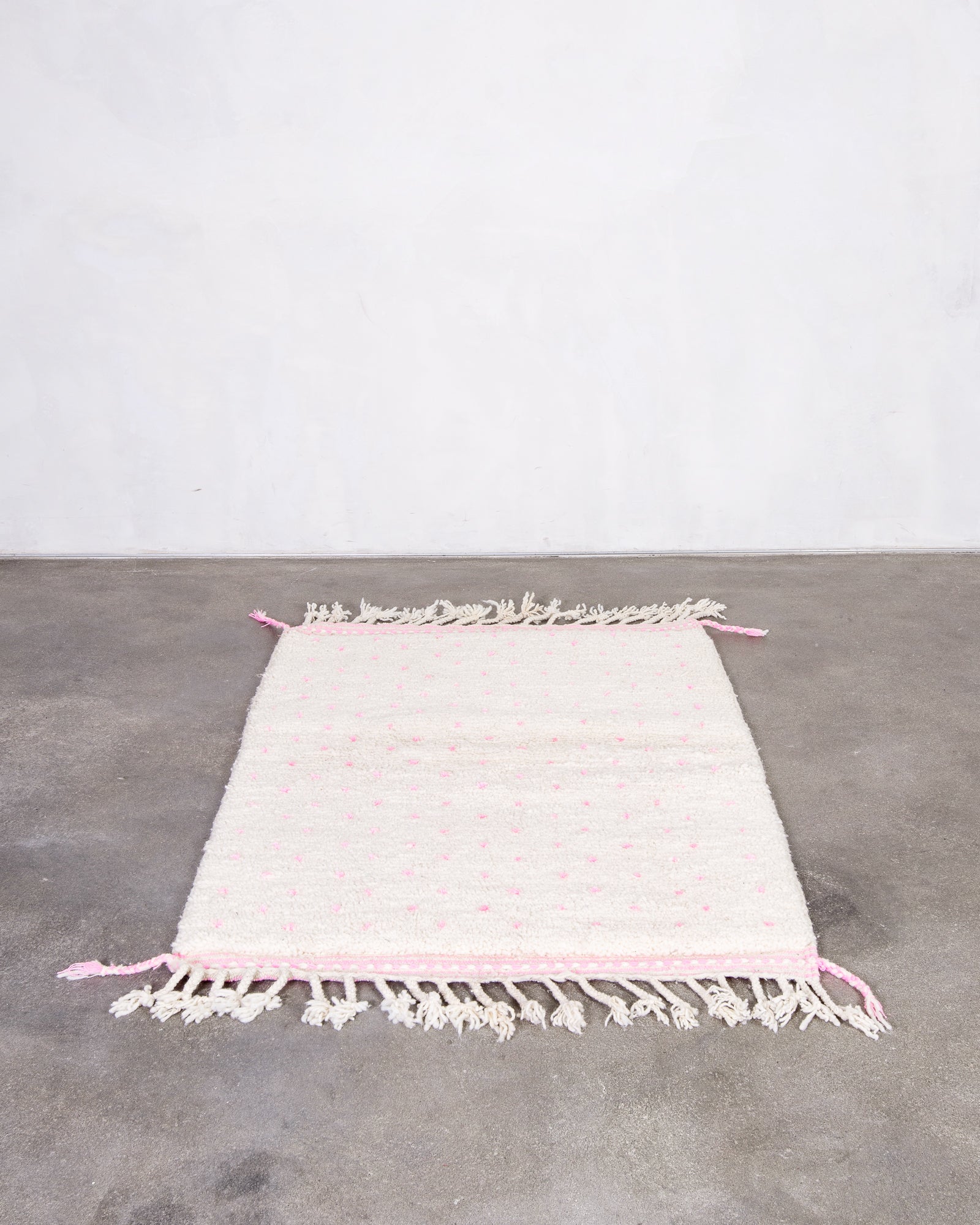 Modern, designer, handcrafted Berber rug from Morocco. Beniourain carpet with beautiful colours and patterns and fluffy wool texture.